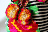 Flores Mochila Pom Pardo