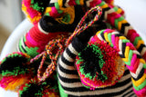 Flores Mochila Pom Pardo